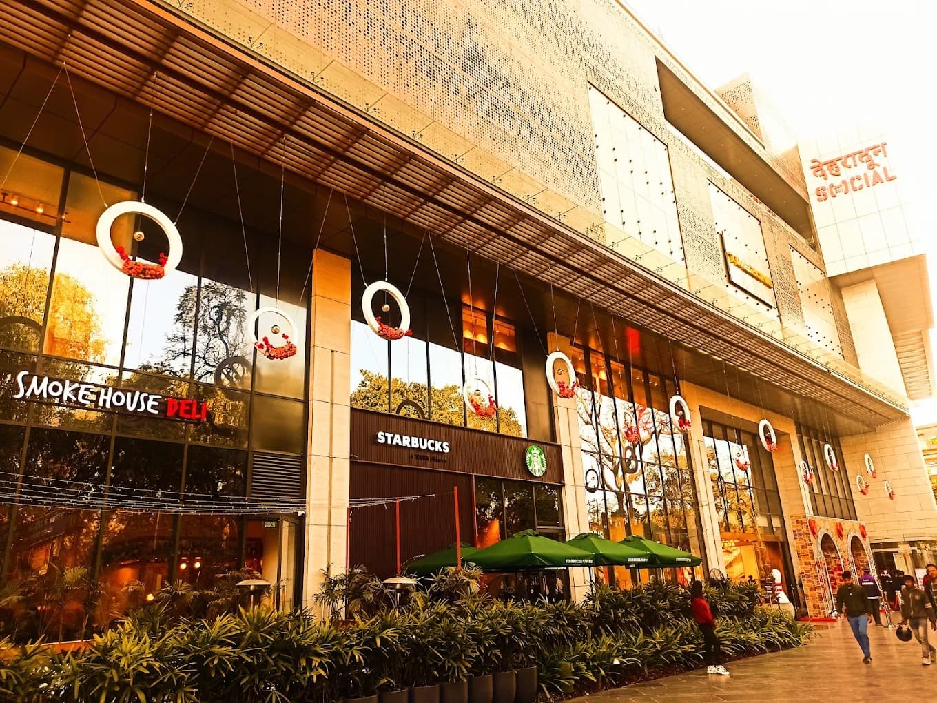 Centrio Mall facade with cafés and shops on New Cantt. Road